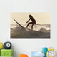 A Surfer Paddling On A Surfboard Off Benavides Beach Wall Mural