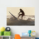 A Surfer Paddling On A Surfboard Off Benavides Beach Wall Mural
