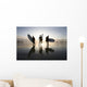 Silhouette Of Three Surfers Carrying Surfboards Wall Mural