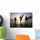 Silhouette Of Three Surfers Carrying Surfboards Wall Mural