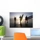 Silhouette Of Three Surfers Carrying Surfboards Wall Mural