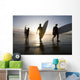 Silhouette Of Three Surfers Carrying Surfboards Wall Mural