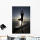 Silhouette Of Female Surfer Doing Yoga Tree Pose Wall Mural