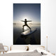 Silhouette Of Female Surfer Doing Warrior Yoga Pose Wall Mural