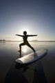 Silhouette Of Female Surfer Doing Warrior Yoga Pose Wall Mural