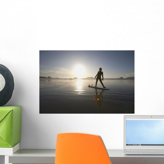 Silhouette Of Female Surfer Doing Yoga Stretches Wall Mural