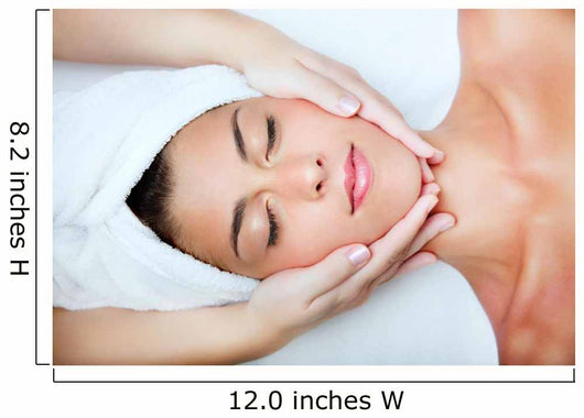 Beautiful young woman receiving facial massage. Wall Mural