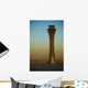 An Airplane Flies Past The Air Traffic Control Tower Wall Mural