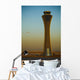 An Airplane Flies Past The Air Traffic Control Tower Wall Mural
