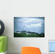 Trees Under A Cloudy Sky Wall Mural