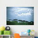 Trees Under A Cloudy Sky Wall Mural