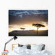 Trees And Animals Across An African Landscape At Sunset Wall Mural