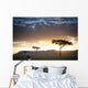 Trees And Animals Across An African Landscape At Sunset Wall Mural