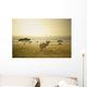 An Antelope Walks In The Grassland At Sunset Wall Mural