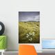 A White Wildflower Growing On A Rugged Landscape Wall Mural