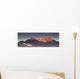 A Building On A Rock Ledge With Alpenglow Over The Mountains Wall Mural