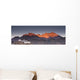 A Building On A Rock Ledge With Alpenglow Over The Mountains Wall Mural
