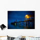 Lights On A Wooden Pier Leading Out In The Water At Night Wall Mural