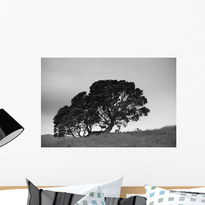 Silhouette Tree with Sheep Wall Mural shown on a wall