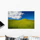 Wooden Fence Posts Running Through A Grassy Field Wall Mural