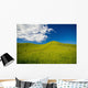 Wooden Fence Posts Running Through A Grassy Field Wall Mural