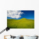 Wooden Fence Posts Running Through A Grassy Field Wall Mural