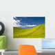 Wooden Fence Posts Running Through A Grassy Field Wall Mural