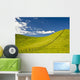 Wooden Fence Posts Running Through A Grassy Field Wall Mural