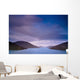 Mountains Along The Coastline Under A Cloudy Sky Wall Mural