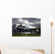 Sunlight Shining Through The Dark Clouds With Trees On The Shoreline Wall Mural