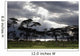 Sunlight Shining Through The Dark Clouds With Trees On The Shoreline Wall Mural