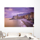 Buildings Along The Coast At Sunset Wall Mural