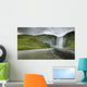 A Waterfall Over A Grassy Cliff Wall Mural