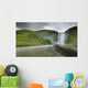 A Waterfall Over A Grassy Cliff Wall Mural