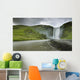A Waterfall Over A Grassy Cliff Wall Mural