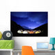 Tents Illuminated In A Valley At Night Wall Mural