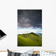 A Lush Green Landscape With Grassy Hills And Trees Wall Mural