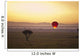 A Red Hot Air Balloon Takes Flight Against The Glowing Sky At Sunset Wall Mural