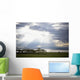 Sunlight Shines Down Through The Clouds Onto A Lake Wall Mural
