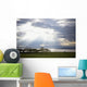 Sunlight Shines Down Through The Clouds Onto A Lake Wall Mural