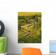 A Wooden Rail Fence Surrounded By Yellow Wildflowers Wall Mural
