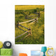 A Wooden Rail Fence Surrounded By Yellow Wildflowers Wall Mural