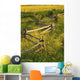 A Wooden Rail Fence Surrounded By Yellow Wildflowers Wall Mural