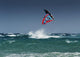 A Windsurfer Flips Upside Down Above The Water Off Punta Paloma Wall Mural