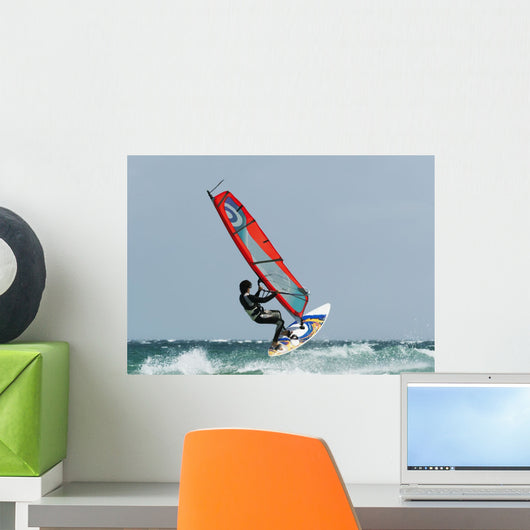 A Windsurfer In The Water Wall Mural