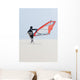 A Windsurfer Walks On The Sand Of Punta Paloma Beach With His Board Wall Mural
