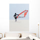 A Windsurfer Walks On The Sand Of Punta Paloma Beach With His Board Wall Mural