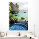 Jacuzzi and infinity pool over tropical ocean Wall Mural