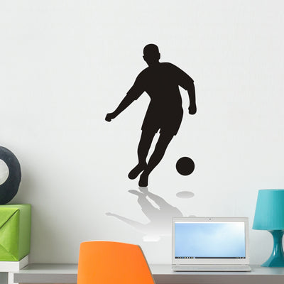 Soccer Player shown on a wall