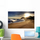 Wave on beach with sun shining. Wall Mural